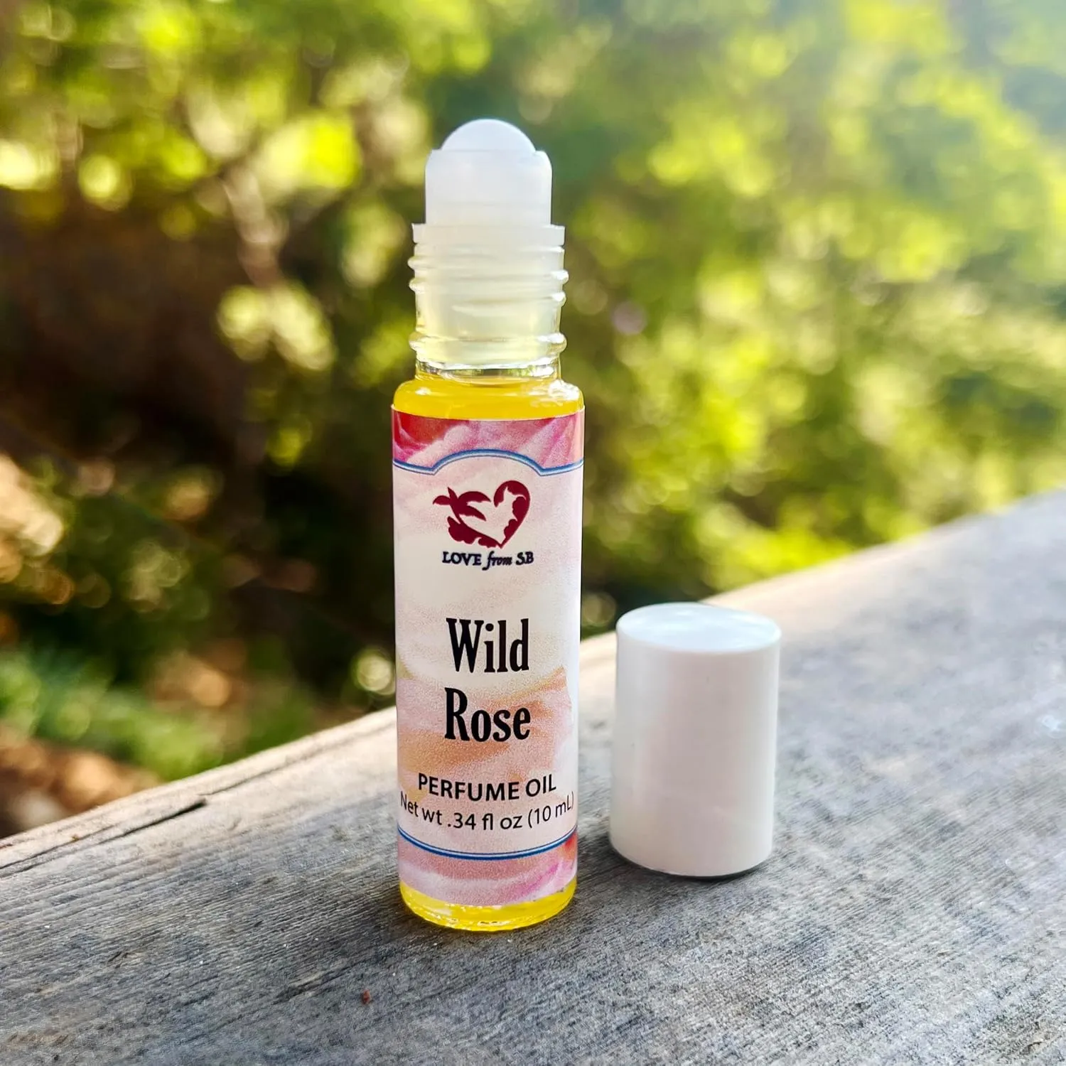Wild Rose Perfume Oil | .03 oz/10 ml Roll On Bottle with Organic Jojoba Oil | Made in Santa Barbara, California (Wild Rose)