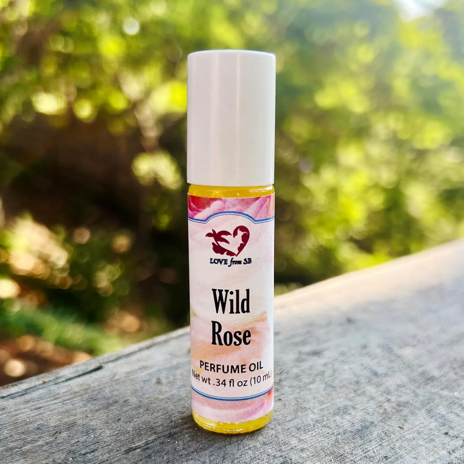 Wild Rose Perfume Oil | .03 oz/10 ml Roll On Bottle with Organic Jojoba Oil | Made in Santa Barbara, California (Wild Rose)